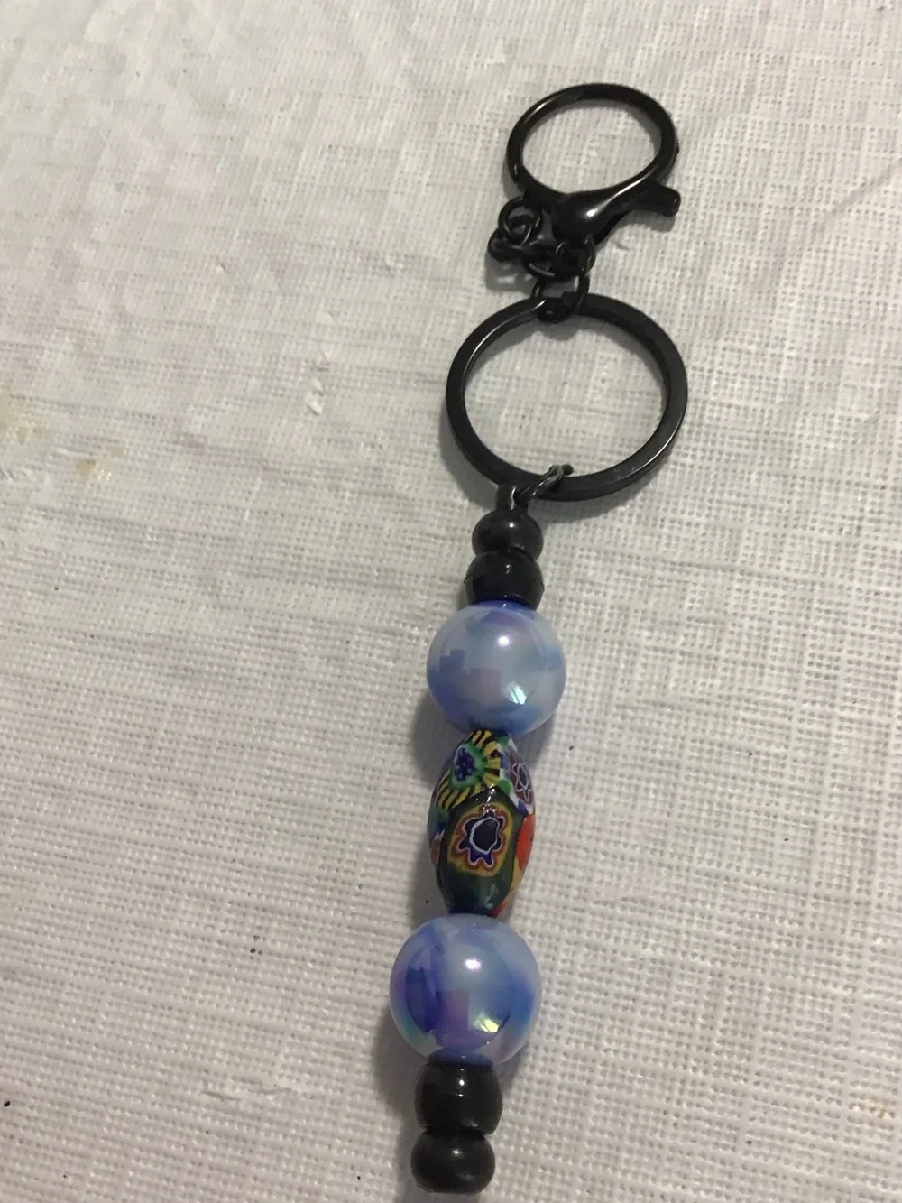 Black Keychain with Iridescent Blue Beads and Multicolor Millefiori Accent